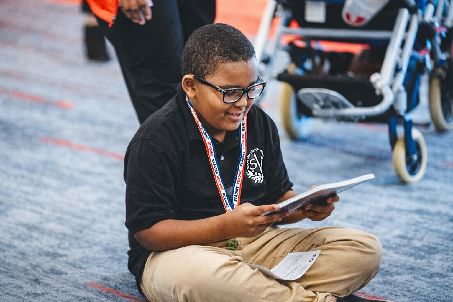 A young boy reading.